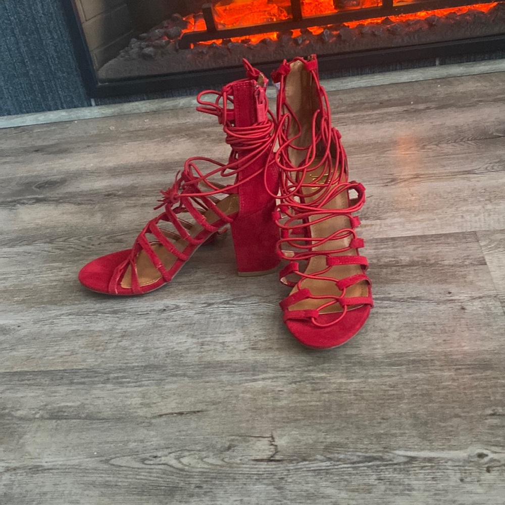 Red lace up heels luxury view